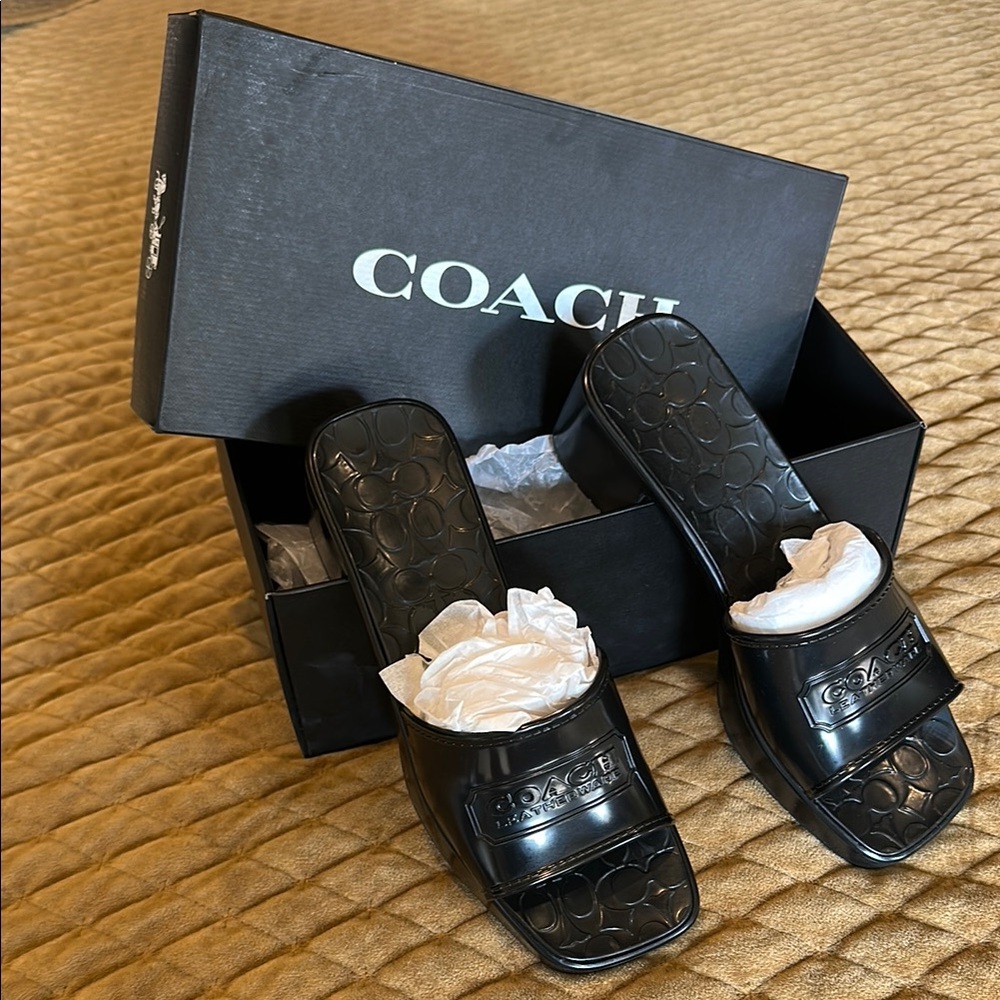 New size 7 Coach Embossed Black Slides New in Box